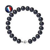 Le bracelet Perlinea NOELYSE est composé de perles de culture de Tahiti noires et rondes de 9/10 mm et d'un fermoir boule en argent 925, disposés en cercle sur fond blanc. Un logo bleu, rouge et blanc de certification de la bijouterie française apparaît dans le coin supérieur gauche.