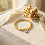 Pulsera de la Suerte - Perla de Agua Dulce - Redonda 5-6 mm Oro