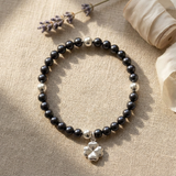 Pulsera de la Suerte - Perla de Agua Dulce - Redonda 5-6 mm Negra Tahití