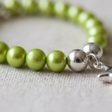Pulsera de la Suerte - Perla de Agua Dulce - Redonda 5-6 mm Verde Tónico