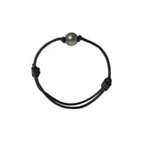 Esta excepcional pulsera para hombre en auténtica perla cultivada de Tahití de 10/11 mm.