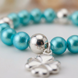 Pulsera de la Suerte- Perla de Agua Dulce- Redonda 5-6 mm Azul Turquesa
