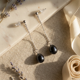 Pendientes colgantes de oro blanco y perlas negras | lolita