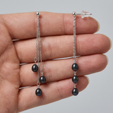 Pendientes colgantes en oro blanco y perla cultivada de Tahití negra