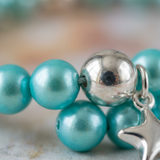 Pulsera de la Suerte- Perla de Agua Dulce- Redonda 5-6 mm Azul Turquesa