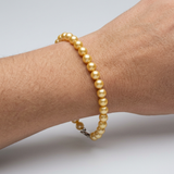 Pulsera de la Suerte - Perla de Agua Dulce - Redonda 5-6 mm Oro