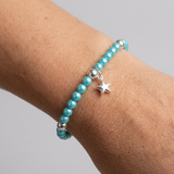 Pulsera de la Suerte- Perla de Agua Dulce- Redonda 5-6 mm Azul Turquesa