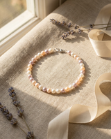 Bracelet argent 925 et perles multicolores roses et blanches 5/6 mm avec fermoir mousqueton.