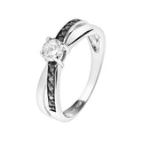 Bague solitaire croisée en argent 925 avec oxyde de zirconium blanc et pavage noir.
